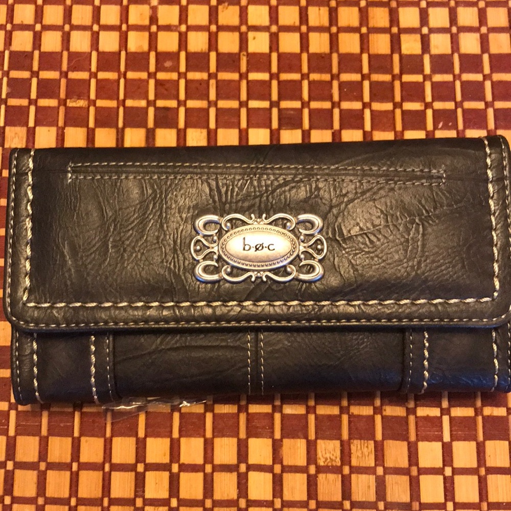 Boc Born Concepts woman’s tri-fold wallet